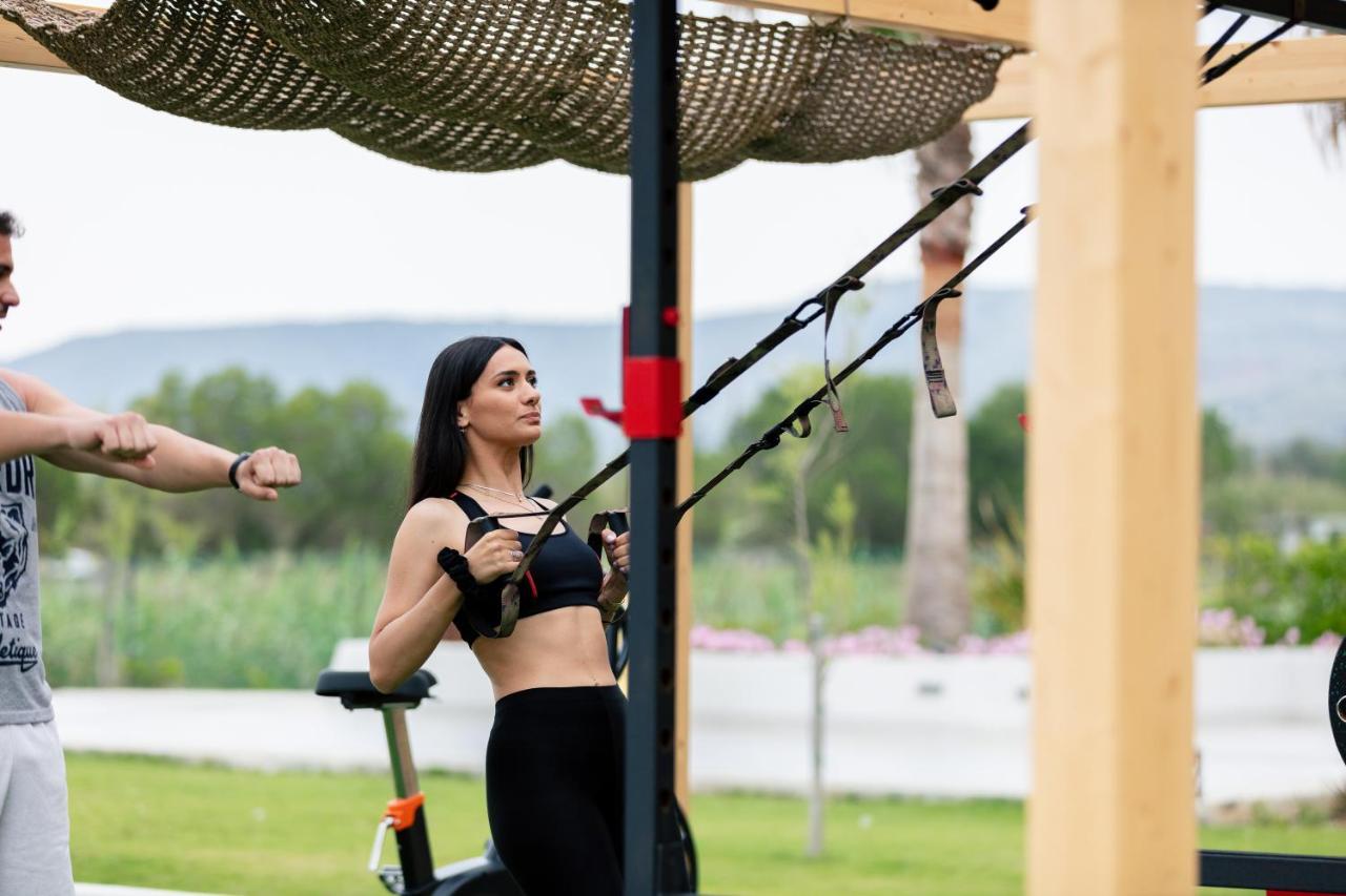 La Mer Resort & Spa - Adults Only Джорджополис Екстериор снимка A woman training with a functional trainer